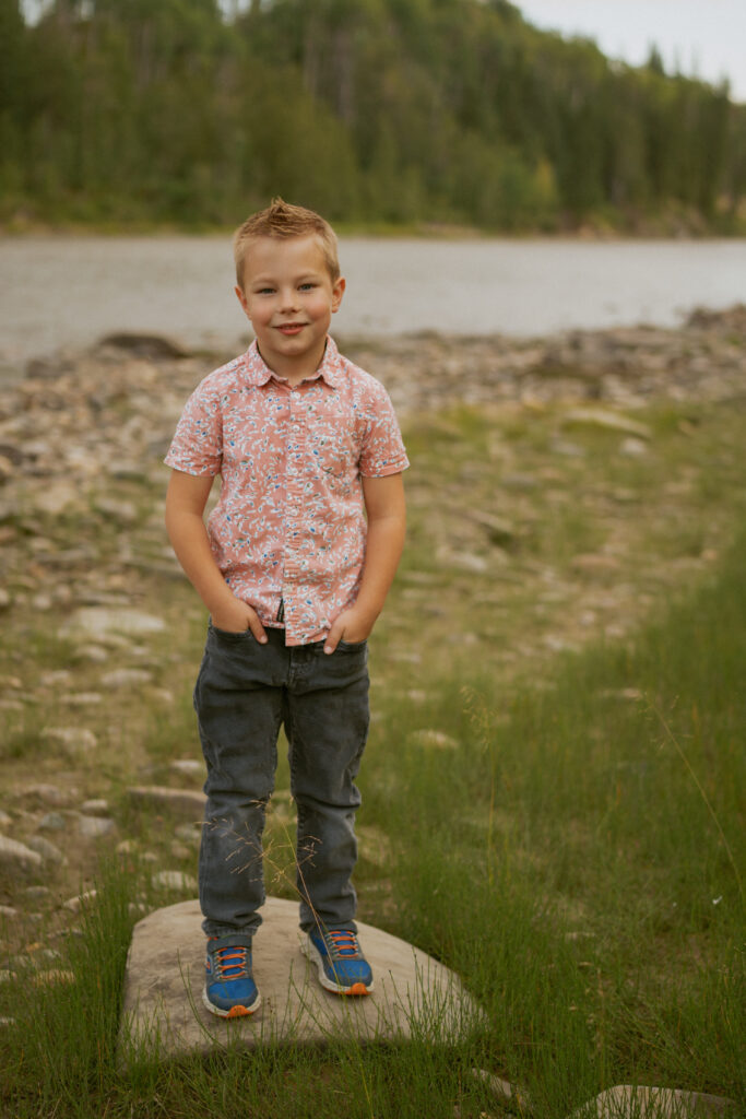 Photo of young boy at river