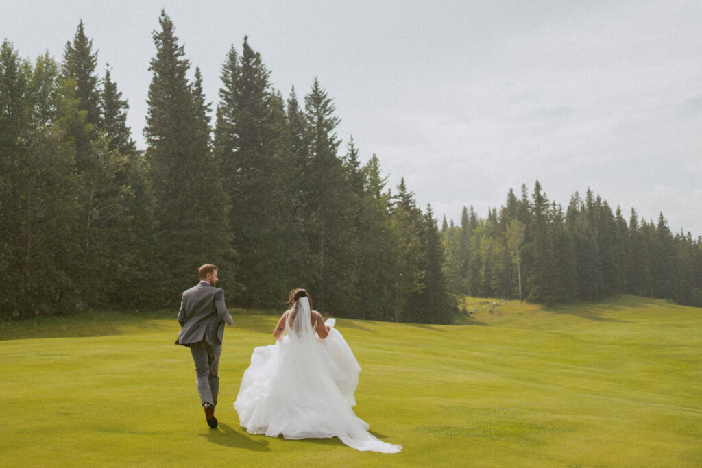 Rainy and romantic moment from Sean and Kayla’s Hinton Alberta wedding.