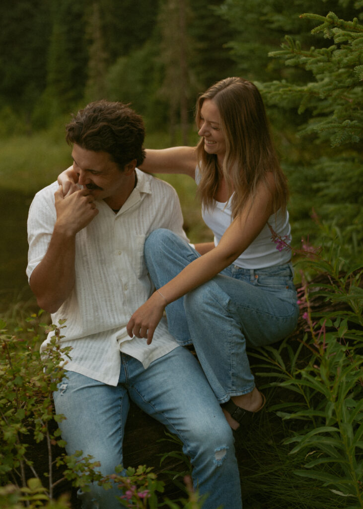 Candid couple photo in nature taken by an Edmonton wedding photographer.