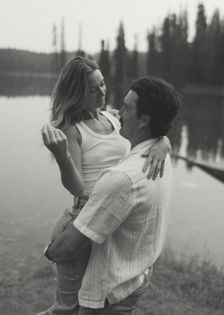 Documentary-style lakeside portrait by Edmonton wedding photographer.