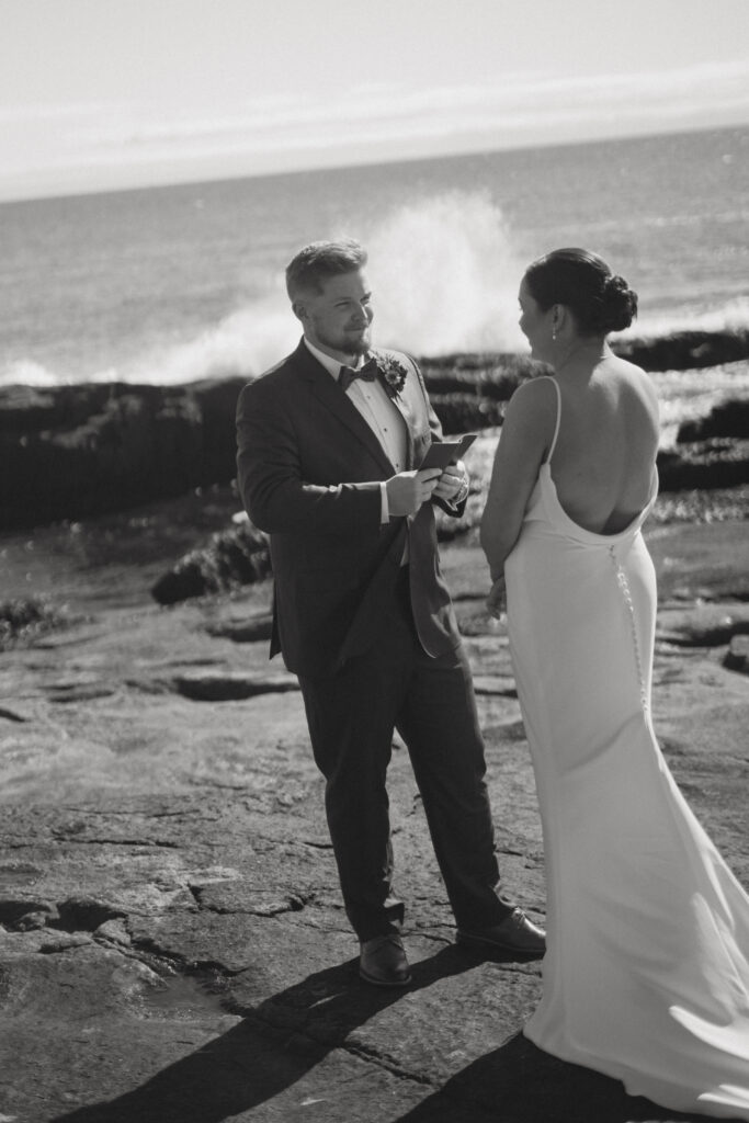 Intimate moment during Keith and Molly’s coastal Acadia elopement.