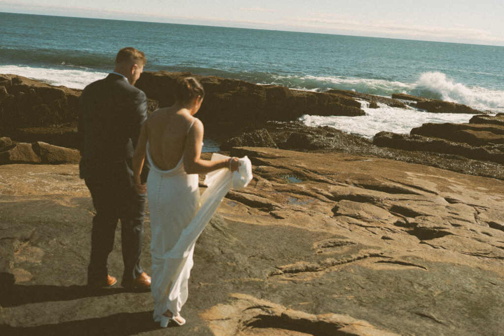Intimate moment during Keith and Molly’s coastal Acadia elopement.