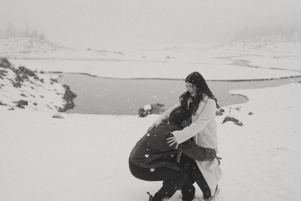 Natural candid engagement photos with wildlife in Jasper National Park