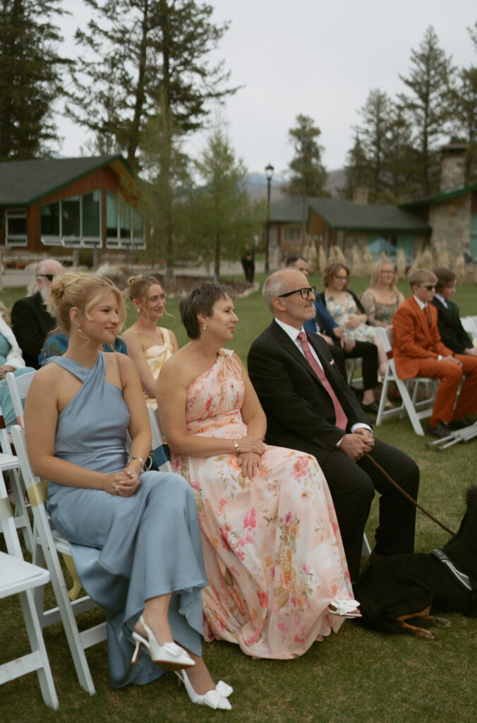 Wedding ceremony overlooking the Canadian Rockies at Fairmont Jasper Park Lodge.