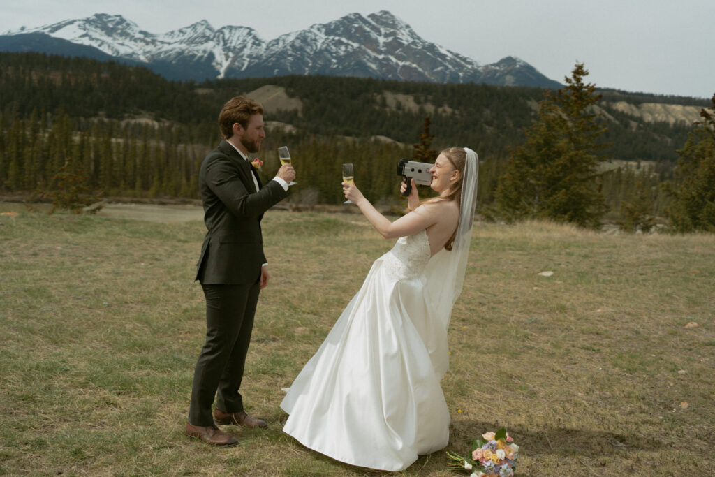 Romantic bridal portraits with mountain views at Fairmont Jasper Park Lodge.