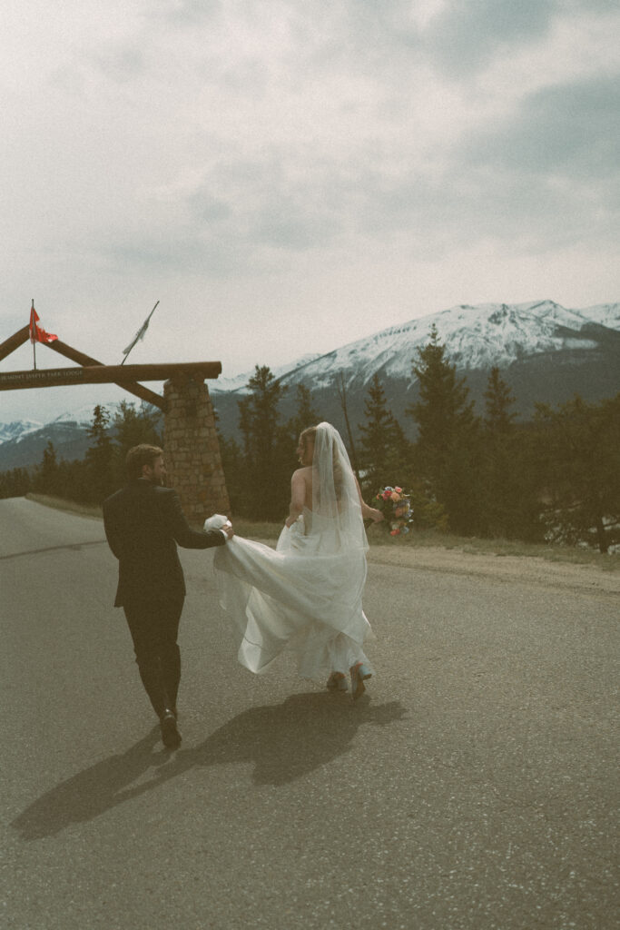 Romantic bridal portraits with mountain views at Fairmont Jasper Park Lodge