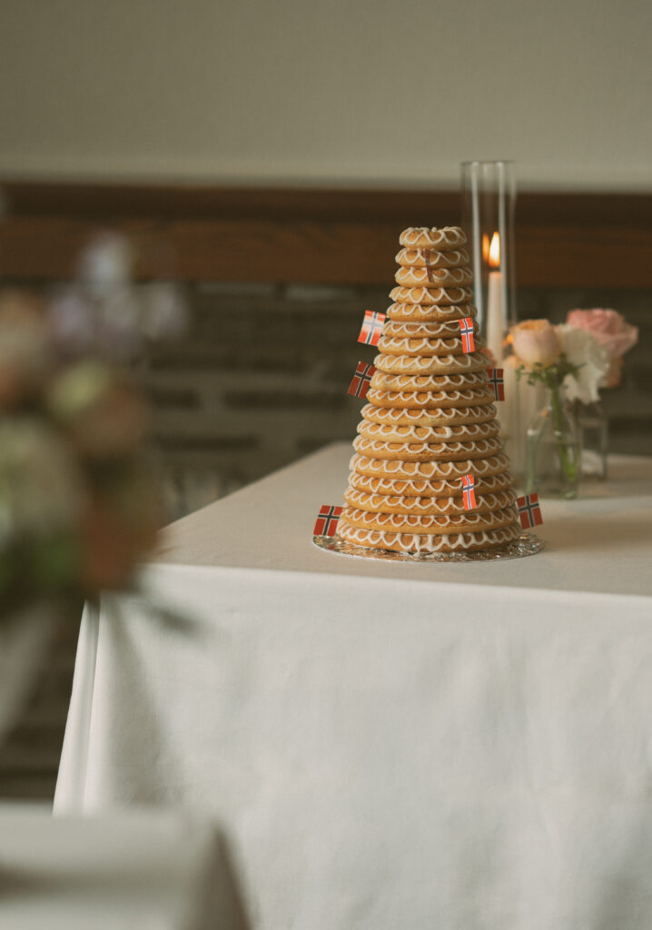 Elegant reception table decorated with candles and spring florals at Fairmont Jasper Park Lodge.